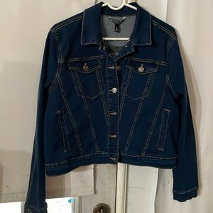 Upcycled Baccini ladies blue jeans jacket size Large. Embellished on the back.!